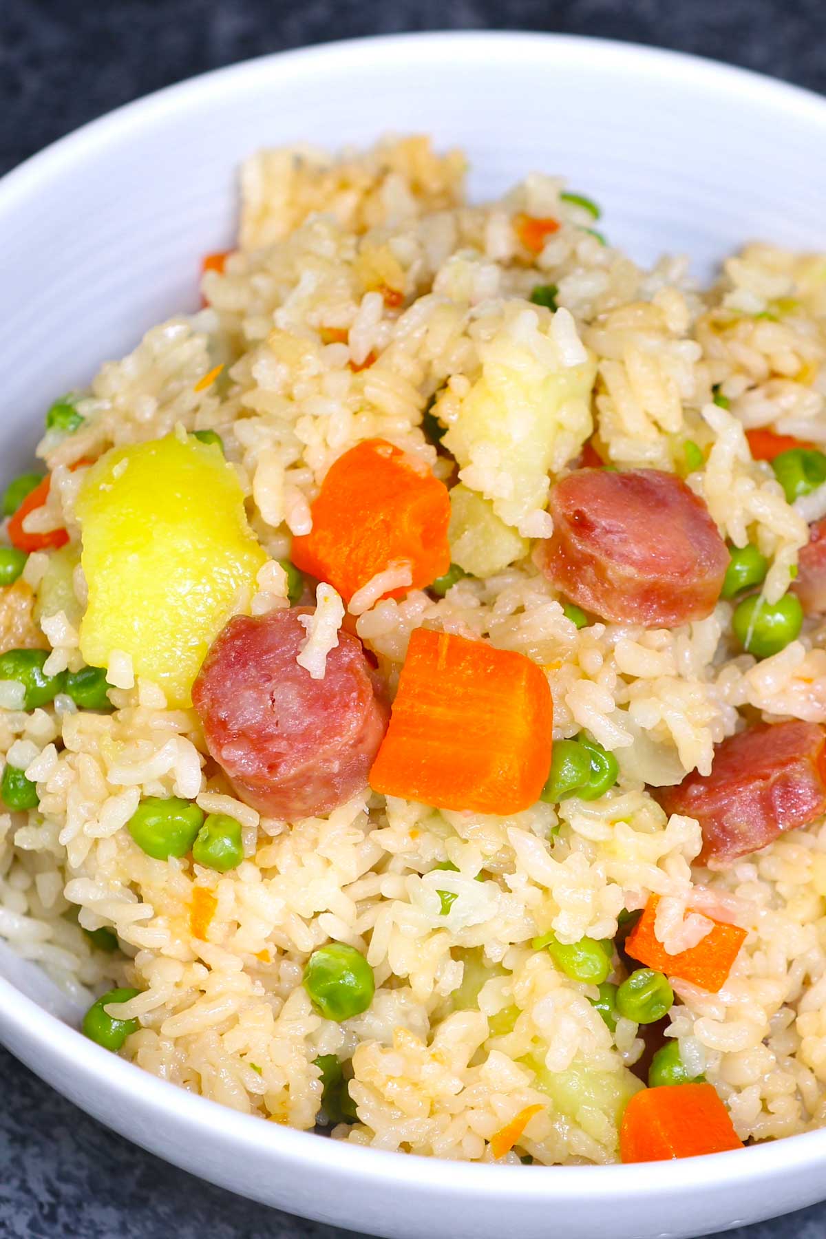 Fried rice with carrots, peas, egg, and Chinese Sausage